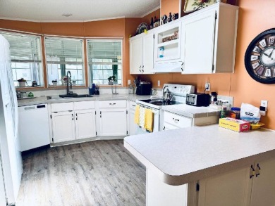 Stunning Retreat in Prestigious Award-Winning 55+ Community on Schalamar Creek Golf and Country Club in Florida - for sale on GolfHomes.com, golf home, golf lot