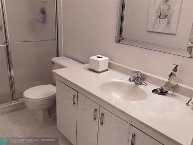 IMMACULATE FURNISHED TURN-KEY 2BR/2BTH! OPEN KITCHEN CONCEPT on Wynmoor Golf Course in Florida - for sale on GolfHomes.com, golf home, golf lot