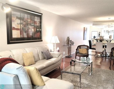 IMMACULATE FURNISHED TURN-KEY 2BR/2BTH! OPEN KITCHEN CONCEPT on Wynmoor Golf Course in Florida - for sale on GolfHomes.com, golf home, golf lot