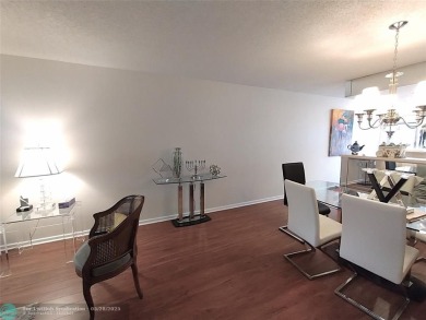 IMMACULATE FURNISHED TURN-KEY 2BR/2BTH! OPEN KITCHEN CONCEPT on Wynmoor Golf Course in Florida - for sale on GolfHomes.com, golf home, golf lot