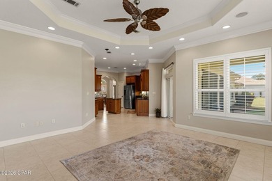 Step into refined coastal living in this beautifully maintained on Emerald Bay Golf Club in Florida - for sale on GolfHomes.com, golf home, golf lot