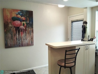 IMMACULATE FURNISHED TURN-KEY 2BR/2BTH! OPEN KITCHEN CONCEPT on Wynmoor Golf Course in Florida - for sale on GolfHomes.com, golf home, golf lot