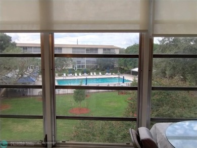 IMMACULATE FURNISHED TURN-KEY 2BR/2BTH! OPEN KITCHEN CONCEPT on Wynmoor Golf Course in Florida - for sale on GolfHomes.com, golf home, golf lot