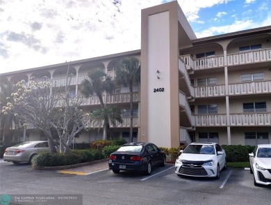 IMMACULATE FURNISHED TURN-KEY 2BR/2BTH! OPEN KITCHEN CONCEPT on Wynmoor Golf Course in Florida - for sale on GolfHomes.com, golf home, golf lot