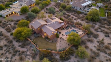 Welcome to this custom-built masterpiece nestled on a secluded 1 on The Country Club At DC Ranch in Arizona - for sale on GolfHomes.com, golf home, golf lot