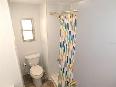 This one just keeps getting better! NEW front porch screen room on Betmar Acres Golf Club in Florida - for sale on GolfHomes.com, golf home, golf lot