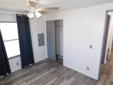 This one just keeps getting better! NEW front porch screen room on Betmar Acres Golf Club in Florida - for sale on GolfHomes.com, golf home, golf lot