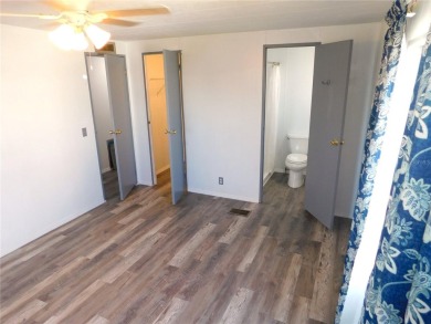 This one just keeps getting better! NEW front porch screen room on Betmar Acres Golf Club in Florida - for sale on GolfHomes.com, golf home, golf lot
