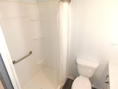 This one just keeps getting better! NEW front porch screen room on Betmar Acres Golf Club in Florida - for sale on GolfHomes.com, golf home, golf lot