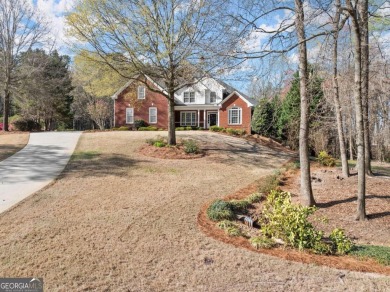 Freshly painted inside & out, newer roof, updated landscaping, & on Royal Lakes Golf and Country Club in Georgia - for sale on GolfHomes.com, golf home, golf lot