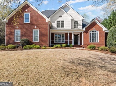 Freshly painted inside & out, newer roof, updated landscaping, & on Royal Lakes Golf and Country Club in Georgia - for sale on GolfHomes.com, golf home, golf lot