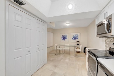 Enjoy the Florida lifestyle in this gorgeous 1st-floor condo in on Boca Grove Golf and Tennis in Florida - for sale on GolfHomes.com, golf home, golf lot