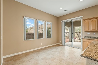 Welcome to this beautiful home located in the highly desirable on Laughlin Ranch Golf Club in Arizona - for sale on GolfHomes.com, golf home, golf lot