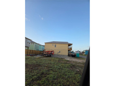 This New Construction home, scheduled to be completed by May 1 on Palmilla Beach Golf Club in Texas - for sale on GolfHomes.com, golf home, golf lot