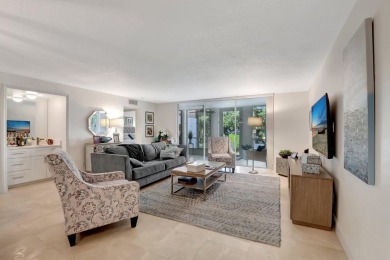 Enjoy the Florida lifestyle in this gorgeous 1st-floor condo in on Boca Grove Golf and Tennis in Florida - for sale on GolfHomes.com, golf home, golf lot
