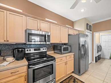 Stunning 3-Bedroom Home with Conservation Views and Prime on The Groves Golf and Country Club in Florida - for sale on GolfHomes.com, golf home, golf lot