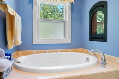 Custom designed home in a private neighborhood Stonebridge on Charlevoix Golf and Country Club in Michigan - for sale on GolfHomes.com, golf home, golf lot