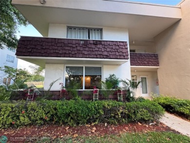 OWNER FINANCING AVAILABLE... EV ELECTRIC CHARGER  installed in on Palm-Aire Country Club and Resort - Palms in Florida - for sale on GolfHomes.com, golf home, golf lot