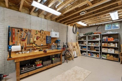 Custom designed home in a private neighborhood Stonebridge on Charlevoix Golf and Country Club in Michigan - for sale on GolfHomes.com, golf home, golf lot