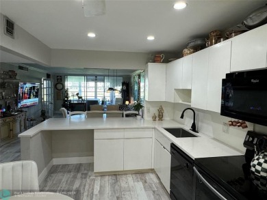 OWNER FINANCING AVAILABLE... EV ELECTRIC CHARGER  installed in on Palm-Aire Country Club and Resort - Palms in Florida - for sale on GolfHomes.com, golf home, golf lot