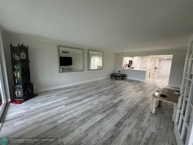 OWNER FINANCING AVAILABLE... EV ELECTRIC CHARGER  installed in on Palm-Aire Country Club and Resort - Palms in Florida - for sale on GolfHomes.com, golf home, golf lot