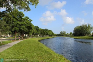 OWNER FINANCING AVAILABLE... EV ELECTRIC CHARGER  installed in on Palm-Aire Country Club and Resort - Palms in Florida - for sale on GolfHomes.com, golf home, golf lot