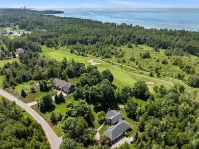 Custom designed home in a private neighborhood Stonebridge on Charlevoix Golf and Country Club in Michigan - for sale on GolfHomes.com, golf home, golf lot