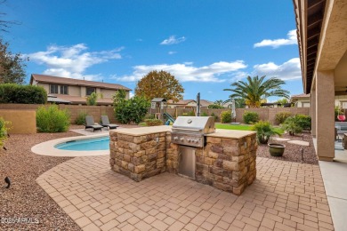 Welcome to this exceptional residence in sought-after Seville on Seville Golf and Country Club in Arizona - for sale on GolfHomes.com, golf home, golf lot