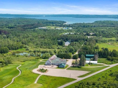 Custom designed home in a private neighborhood Stonebridge on Charlevoix Golf and Country Club in Michigan - for sale on GolfHomes.com, golf home, golf lot