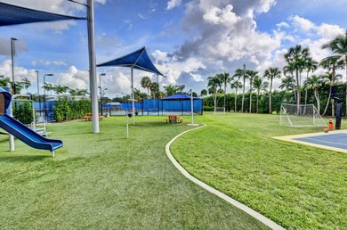 Enjoy the Florida lifestyle in this gorgeous 1st-floor condo in on Boca Grove Golf and Tennis in Florida - for sale on GolfHomes.com, golf home, golf lot