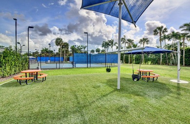 Enjoy the Florida lifestyle in this gorgeous 1st-floor condo in on Boca Grove Golf and Tennis in Florida - for sale on GolfHomes.com, golf home, golf lot