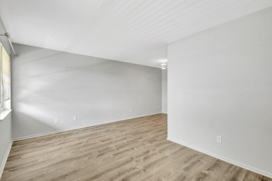 Newly painted, completely updated 1/1 unit with lake and golf on Vero Beach South Golf Course in Florida - for sale on GolfHomes.com, golf home, golf lot