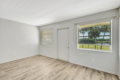 Newly painted, completely updated 1/1 unit with lake and golf on Vero Beach South Golf Course in Florida - for sale on GolfHomes.com, golf home, golf lot