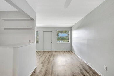 Newly painted, completely updated 1/1 unit with lake and golf on Vero Beach South Golf Course in Florida - for sale on GolfHomes.com, golf home, golf lot