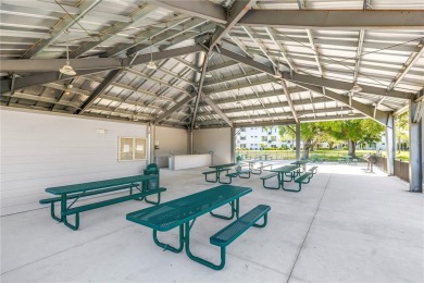 Live the easy life!!! PARKING SPACE DIRECTLY IN FRONT OF on On Top Of The World Golf Course in Florida - for sale on GolfHomes.com, golf home, golf lot