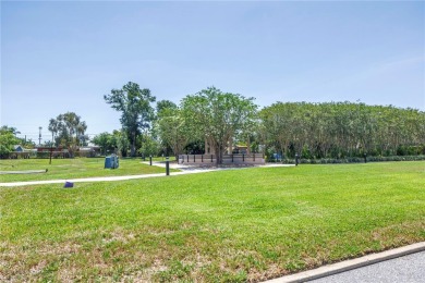 Live the easy life!!! PARKING SPACE DIRECTLY IN FRONT OF on On Top Of The World Golf Course in Florida - for sale on GolfHomes.com, golf home, golf lot
