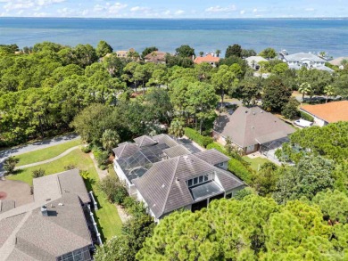 Experience luxury coastal living in this 4-bedroom, 4-bathroom on Kelly Plantation Golf Club in Florida - for sale on GolfHomes.com, golf home, golf lot