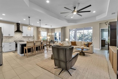 Pool home ~ nestled within the coveted Windward community in the on The Founders Golf Club in Florida - for sale on GolfHomes.com, golf home, golf lot