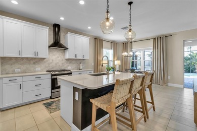 Pool home ~ nestled within the coveted Windward community in the on The Founders Golf Club in Florida - for sale on GolfHomes.com, golf home, golf lot