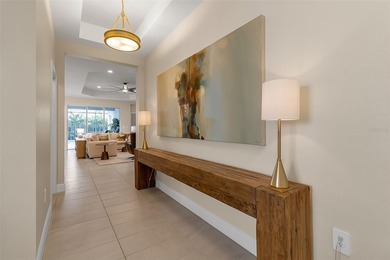 Pool home ~ nestled within the coveted Windward community in the on The Founders Golf Club in Florida - for sale on GolfHomes.com, golf home, golf lot