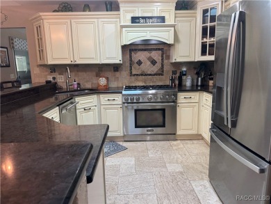 Welcome to this beautiful 3-bedroom, 2-bath pool home nestled in on Pine Ridge Community Golf and Country Club in Florida - for sale on GolfHomes.com, golf home, golf lot