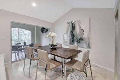 Enjoy the Florida lifestyle in this gorgeous 3rd-floor condo in on Boca Grove Golf and Tennis in Florida - for sale on GolfHomes.com, golf home, golf lot
