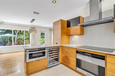 Set on a quiet, tree-lined street, this beautifully updated on Granada Golf Club in Florida - for sale on GolfHomes.com, golf home, golf lot