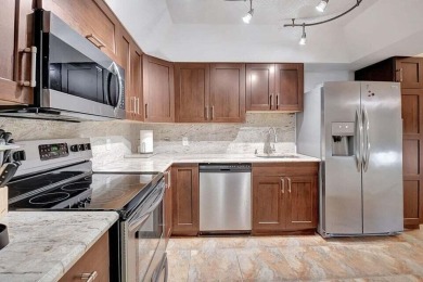 Enjoy the Florida lifestyle in this gorgeous 3rd-floor condo in on Boca Grove Golf and Tennis in Florida - for sale on GolfHomes.com, golf home, golf lot