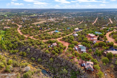 This exceptional 25,265 sq ft mountain parcel in White Mountain on Silver Creek Golf Club in Arizona - for sale on GolfHomes.com, golf home, golf lot