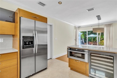 Set on a quiet, tree-lined street, this beautifully updated on Granada Golf Club in Florida - for sale on GolfHomes.com, golf home, golf lot