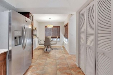 Enjoy the Florida lifestyle in this gorgeous 3rd-floor condo in on Boca Grove Golf and Tennis in Florida - for sale on GolfHomes.com, golf home, golf lot