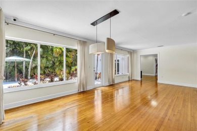Set on a quiet, tree-lined street, this beautifully updated on Granada Golf Club in Florida - for sale on GolfHomes.com, golf home, golf lot