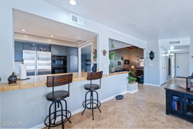 Discover this beautiful home located in the highly desirable on London Bridge Golf Course in Arizona - for sale on GolfHomes.com, golf home, golf lot