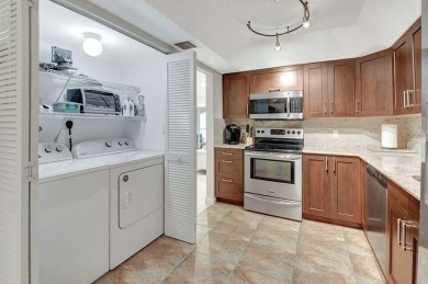 Enjoy the Florida lifestyle in this gorgeous 3rd-floor condo in on Boca Grove Golf and Tennis in Florida - for sale on GolfHomes.com, golf home, golf lot